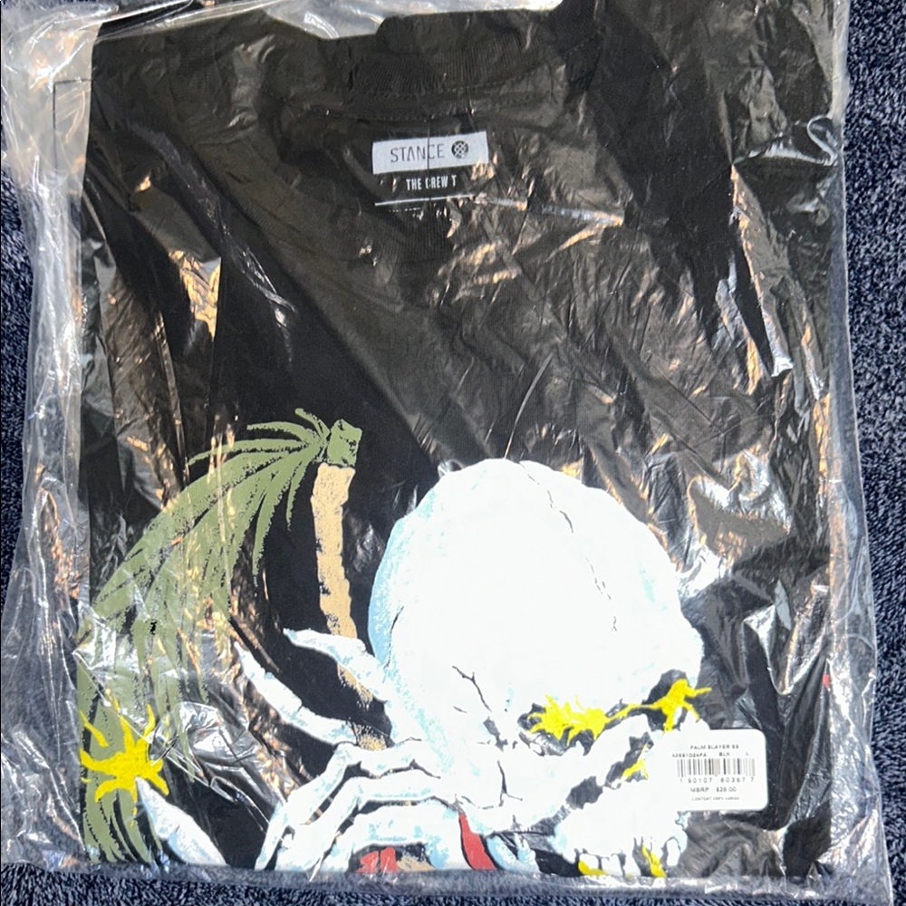 Black Graphic Tee with Skull and Palm Design